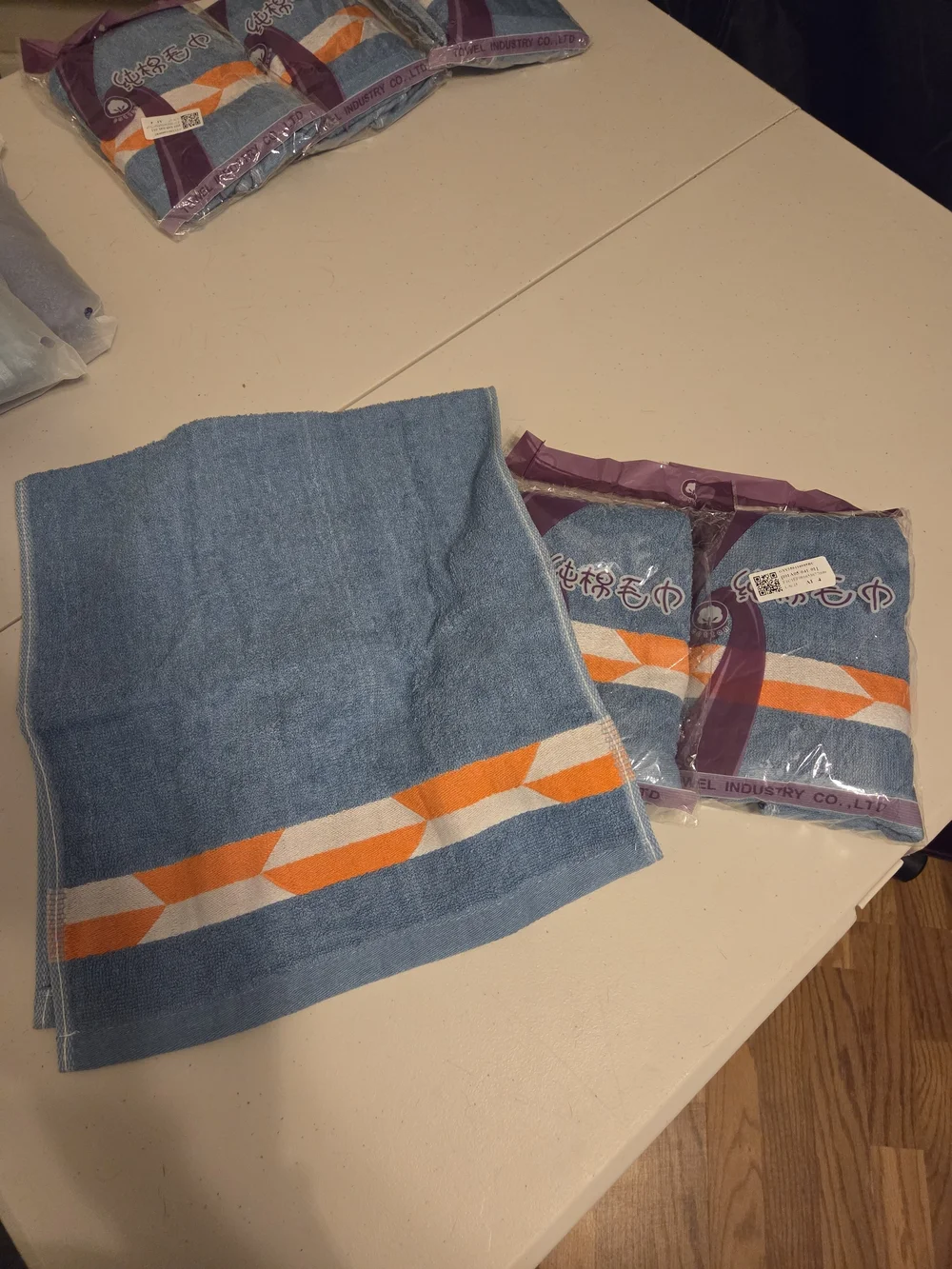Blue Hand Towel with Orange & White Geometric Border